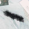 Verführerische schwarze Spitzen-Beinschleifen mit Schleifen-Detail – dehnbar, komfortabel und stylisch.